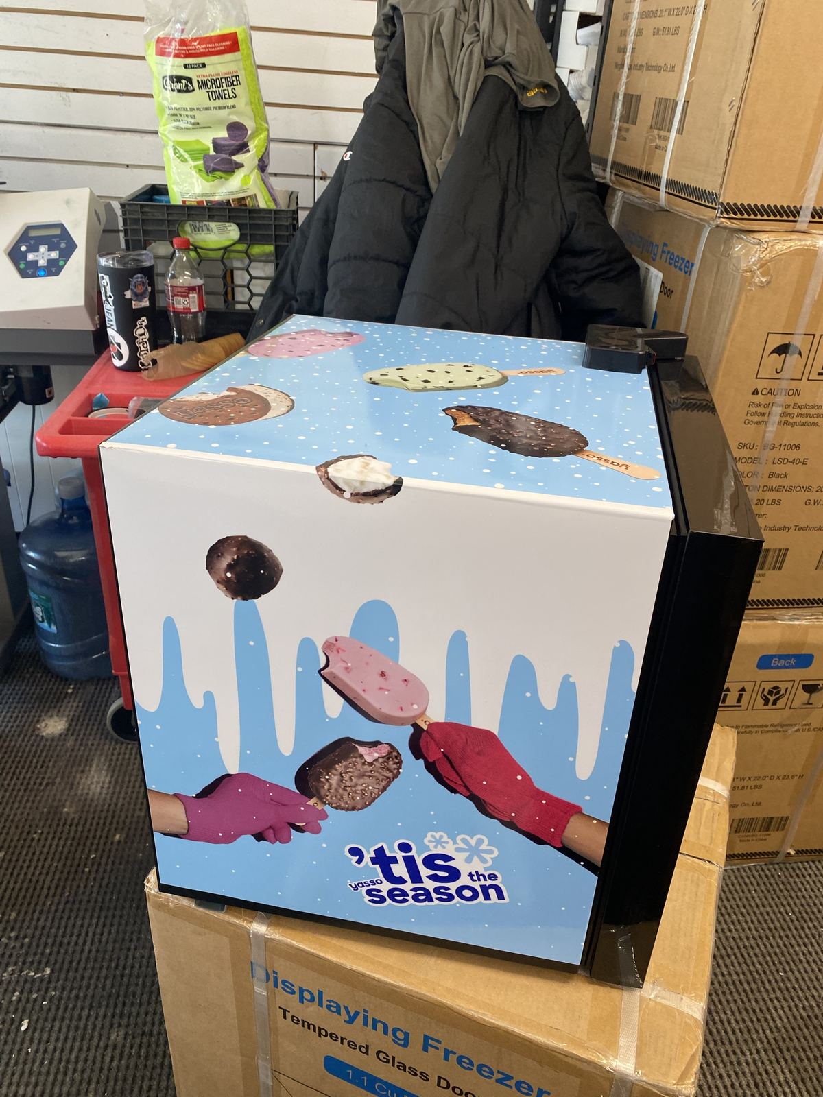 Fully wrapped display freezer