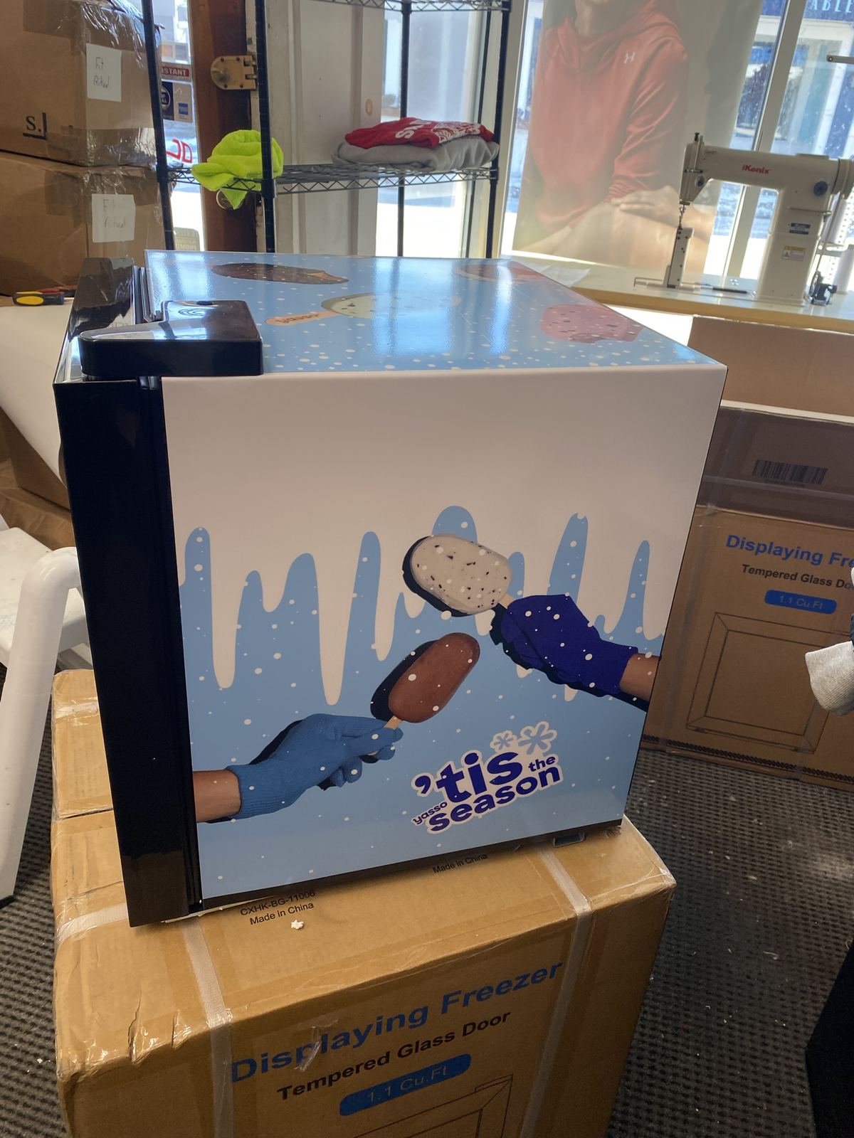 Wrapped display freezer, side and top