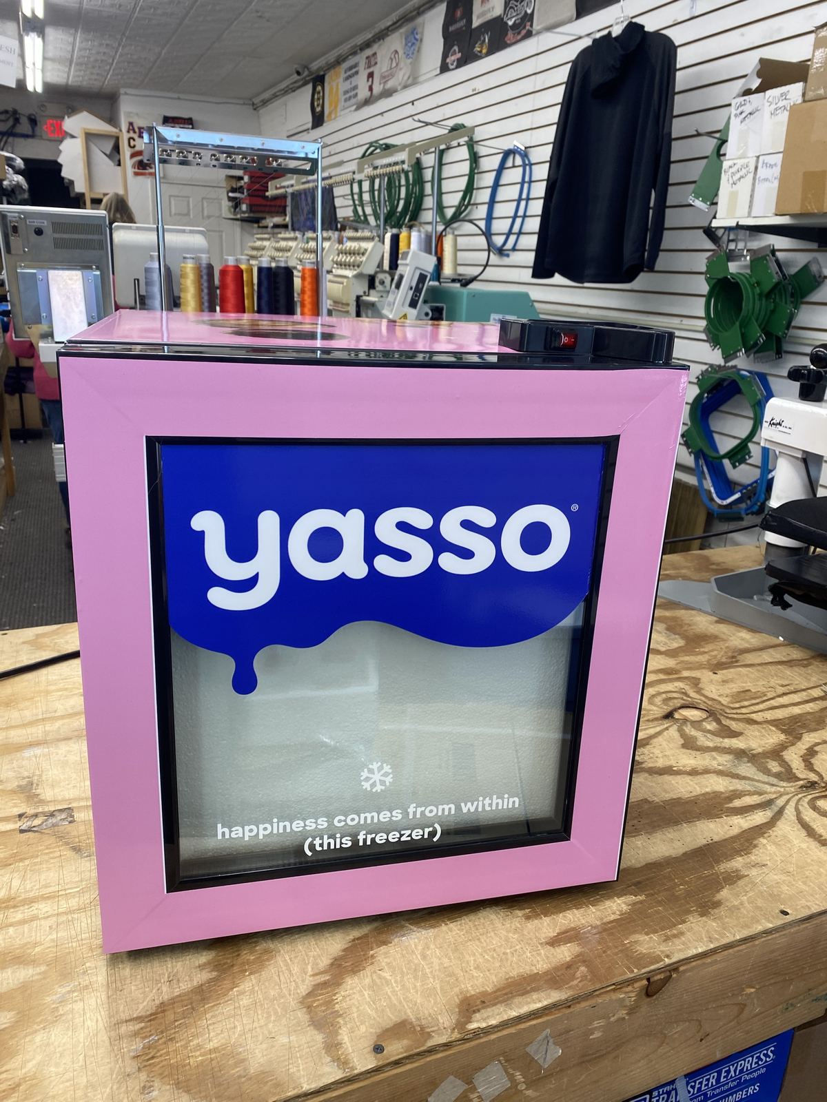 Display freezer wrap with door graphic