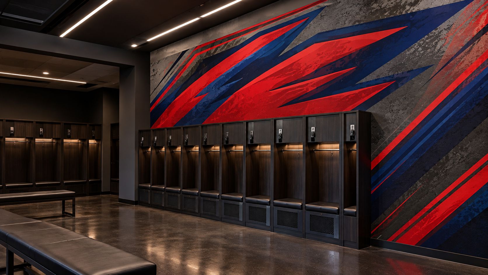 Locker room wall wrap with bold navy and red graphics above a row of lockers