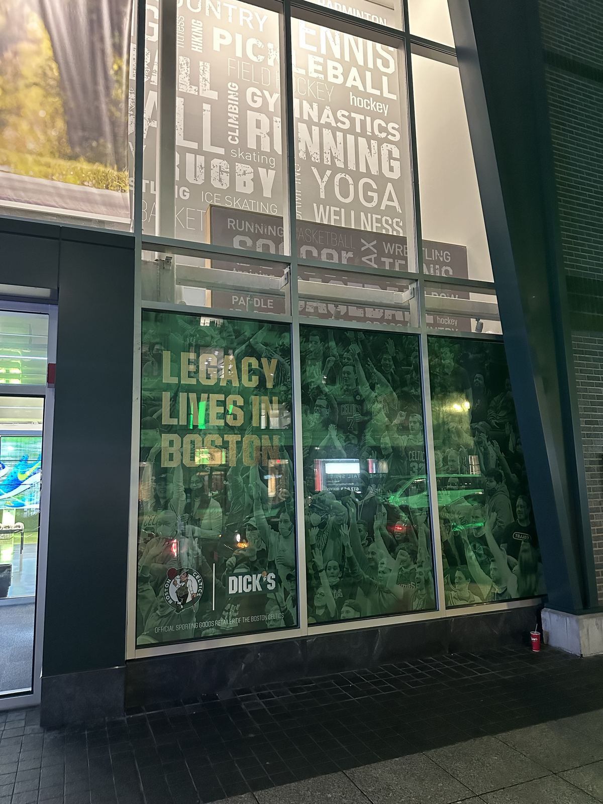 Storefront window graphics viewed from the sidewalk
